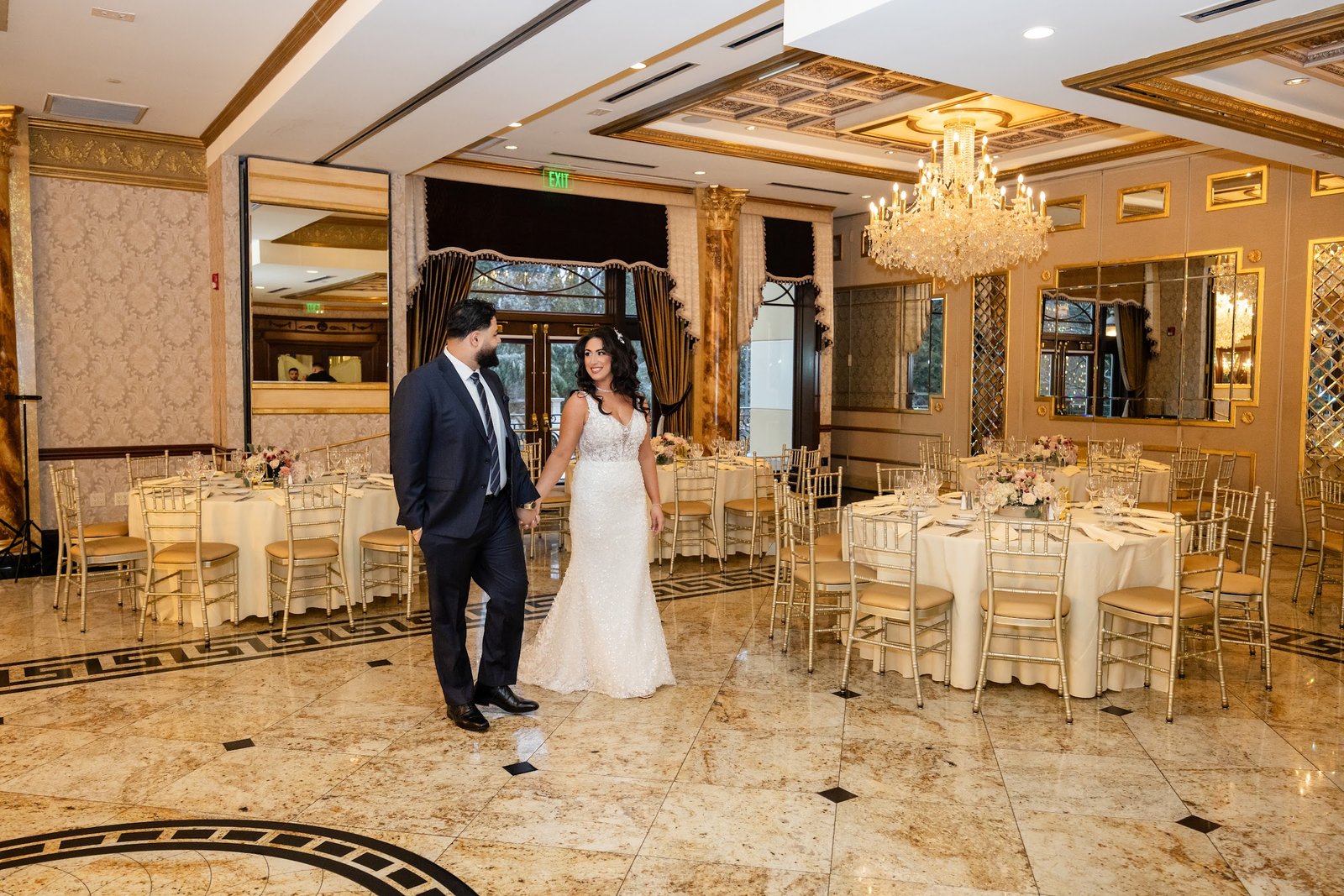 Couple standing together in the ballroom