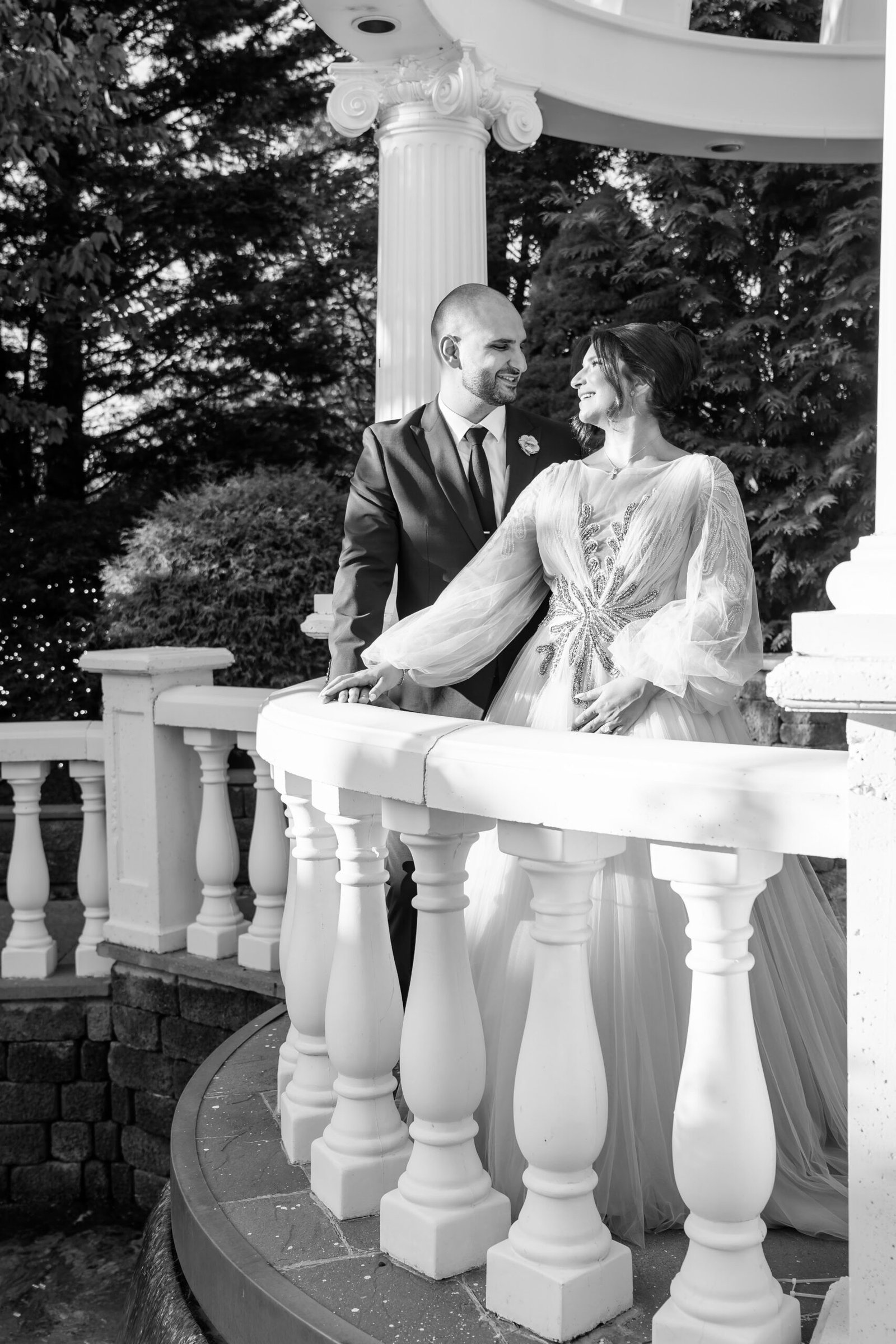 Black and white photograph of the couple on the terrace