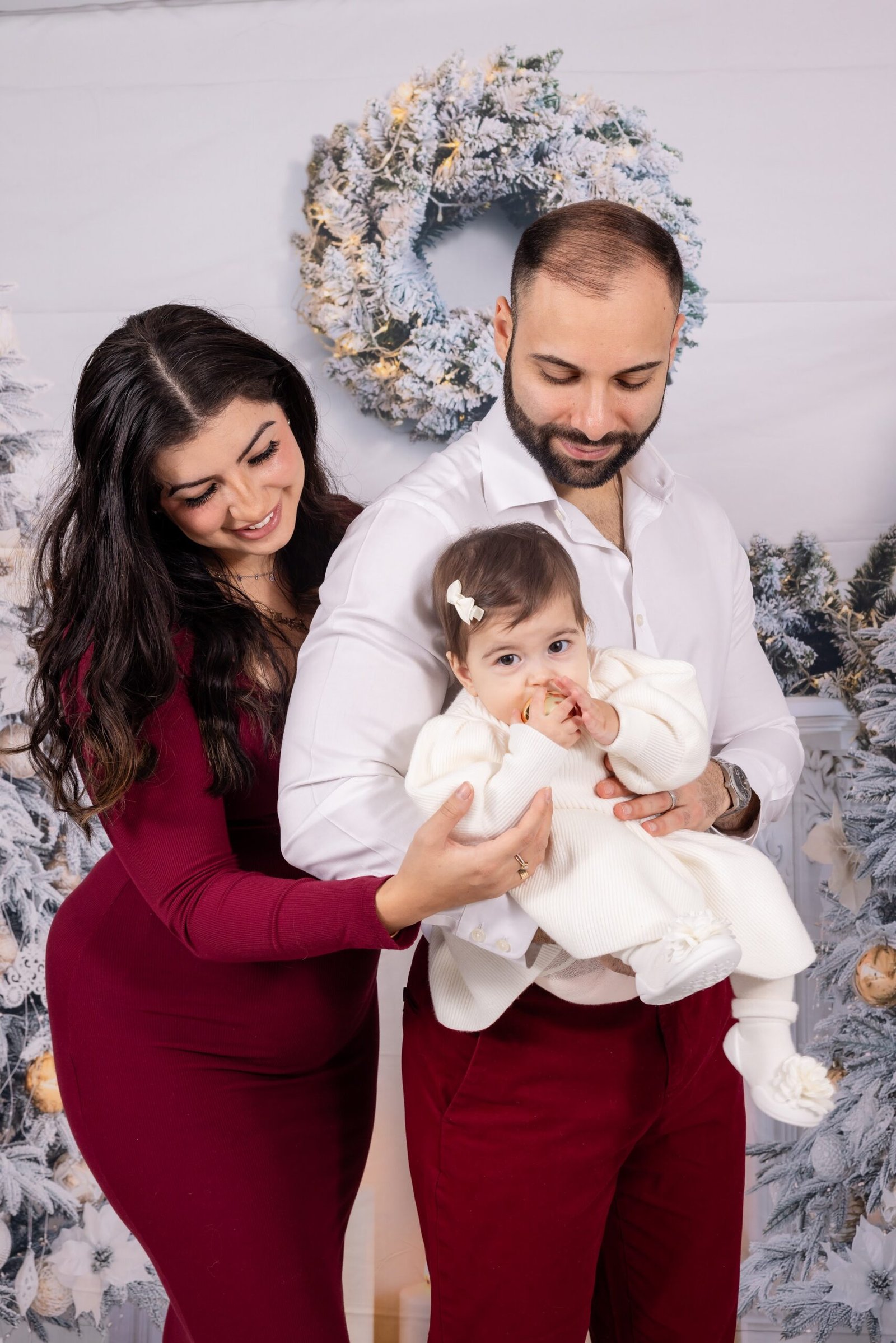 Parents holding their baby at the family session