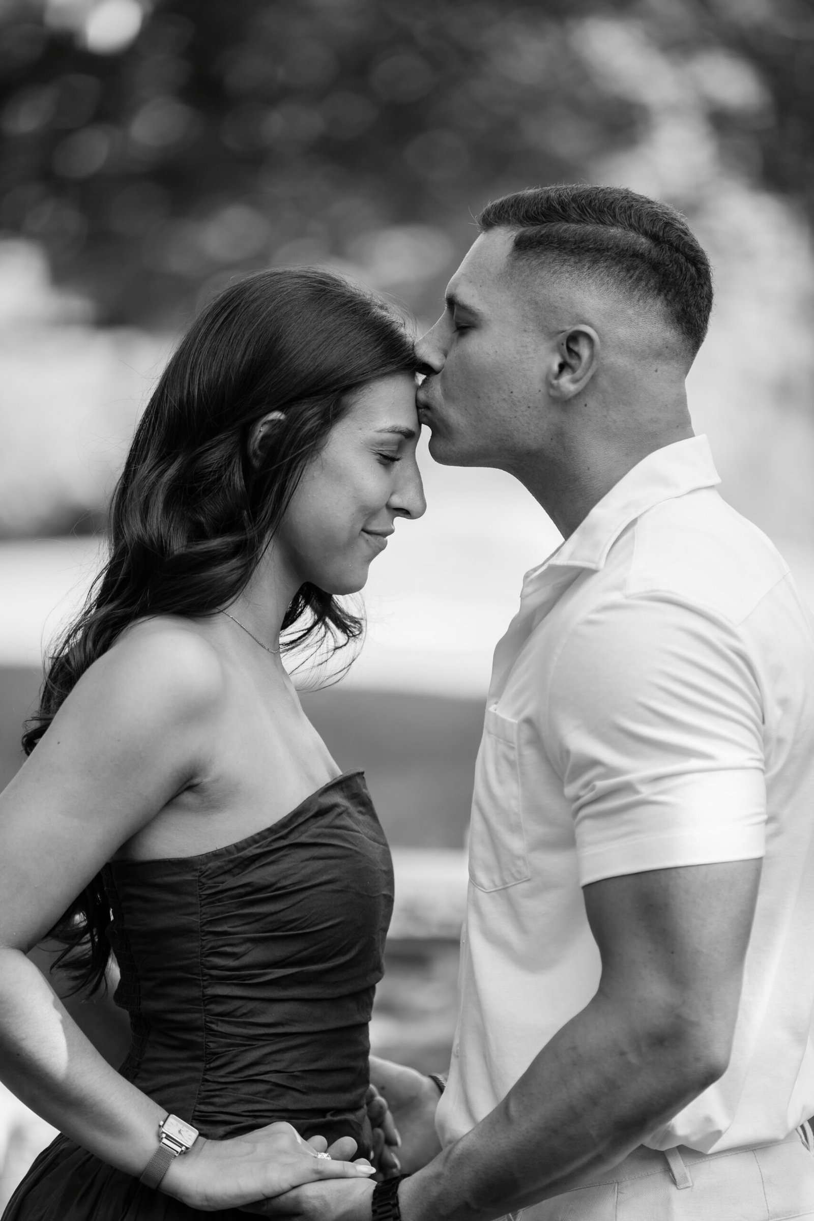 Black and white portrait of the couple after the proposal