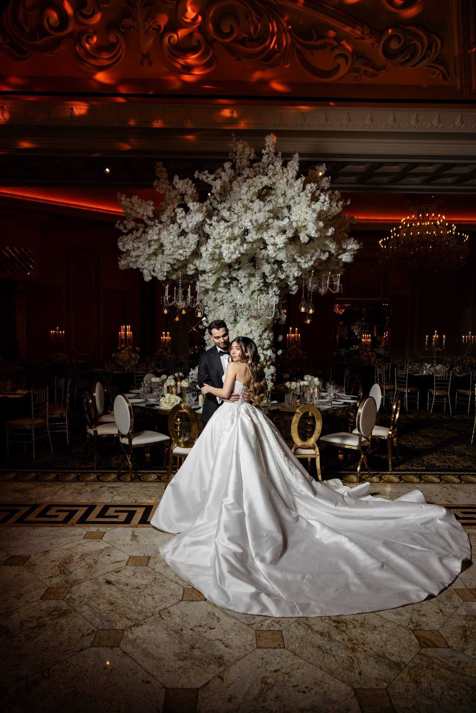 Bride and groom together in the reception hall
