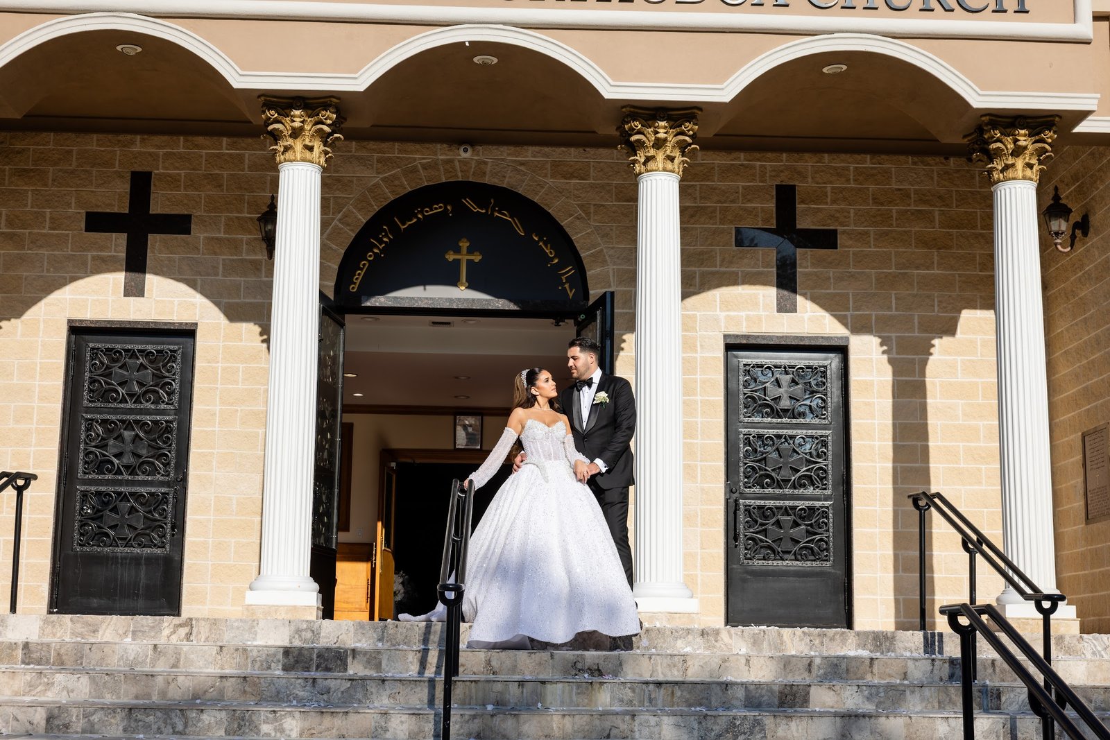Bride on the steps of the church